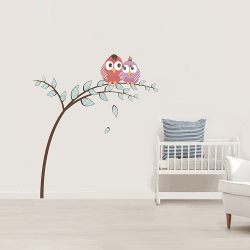 Árbol con búhos enamorados
